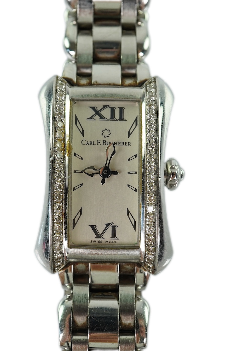 A lady's 2007 stainless steel and diamond set Carl F. Bucherer quartz wrist watch, on a stainless steel bracelet